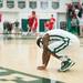 Huron's Ernest Johnson falls to his knees as the buzzer rings and falling to score the needed three point against Bedford to tie the game.
Courtney Sacco I AnnArbor.com 