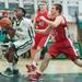 Huron's Demetrius Sims jumps to make a shot against Beford during first half of their game Thursday evening at Huron High School.
Courtney Sacco I AnnArbor.com 