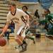 Dexter's Derek Seidl drives the ball up court  during against Huron during the first half of the Class A district semifinals at Skyline High School Wednesday Mar. 6th.
Courtney Sacco I AnnArbor.com   