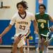 Dexter's London Truman drives the ball up court against Huron's Chrus Mosley during the first half of the Class A district semifinals at Skyline High School Wednesday Mar. 6th.
Courtney Sacco I AnnArbor.com   