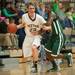 Dexter's Derek Seidl drives the ball up court against Huron's Ernest Johnson during the first half of the Class A district semifinals at Skyline High School Wednesday Mar. 6th.
Courtney Sacco I AnnArbor.com   