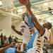 The Phoenix's Jaylen Johnson and LaVonte Davis jump to make a  rebound against the Eagles during the fist half of the Class A district semifinals at Skyline High School Wednesday Mar. 6th.
Courtney Sacco I AnnArbor.com   
