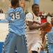 The Phoenix's Jaylen Johnson drives the ball as he tries to make a basket against the Eagles Marquis Wesley during the fist half of the Class A district semifinals at Skyline High School Wednesday Mar. 6th.
Courtney Sacco I AnnArbor.com   