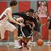 Latin Davis drives the ball up court against Temperance Bedford during  the district final game at Temperance Bedford high school Friday Mar. 8th.
Courtney Sacco I AnnArbor.com 