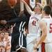 Latin Davis jumps to make a layup against Temperance Bedford during  the district final game at Temperance Bedford high school Friday Mar. 8th.
Courtney Sacco I AnnArbor.com 