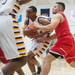 Ypsilanti's Jalen Harmon drives the ball during first half of the regional semifinal game against Canton at Huron High School March 11.
Courtney Sacco I AnnArbor.com  