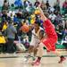 Ypsilanti's Corey Allen drives the ball to the basket during second half of the regional semifinal game against Canton at Huron High School March 11.
Courtney Sacco I AnnArbor.com  