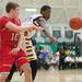Ypsilanti's Jaylen Johnson reaches for a loose ball after Canton's Scott hits it out of his hands during first half of the regional semifinal game at Huron High School March 11th.
Courtney Sacco I AnnArbor.com  