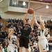 Dexter's Crystal Kedroske jumps to make a rebound during first half of the state quarterfinals game against Heritage at Davison High School Tuesday, Mar. 13th.
Courtney Sacco I AnnArbor.com  
