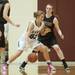 Heritage's Jayde drives the ball to the basket against Dexter's Emma Kill during first half of the state quarterfinals game at Davison High School Tuesday, Mar. 13th.
Courtney Sacco I AnnArbor.com  