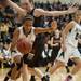 Dexter's Emma Kill forces Heritage's Destiny Wallace out of bounds during first half of the state quarterfinals game at Davison High School Tuesday, Mar. 13th.
Courtney Sacco I AnnArbor.com  