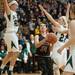 Dexter's Teia McGahey jumps to make a basket  during first half of the state quarterfinals game against Heritage at Davison High School Tuesday, Mar. 13th.
Courtney Sacco I AnnArbor.com  