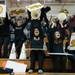 The Dexter cheerleaders celebrate in the stands after Dexter scores a basket during second half of the state quarterfinals game against Heritage at Davison High School Tuesday, Mar. 13th.
Courtney Sacco I AnnArbor.com  