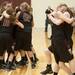 Dexter's varsity girls basketball team celebrates after defeating Heritage 34-33 in the state Class A quarterfinals game at Davison High School Tuesday, Mar. 13th.
Courtney Sacco I AnnArbor.com  