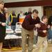 Dexter's head coach Mike Bavineau celebrates with his son, 8 year old Assistant coach Cal Bavineau after Dexter's win over Heritage at Davison High School Tuesday, Mar. 13th.
Courtney Sacco I AnnArbor.com  