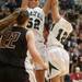 Heritage's Jayde Abenth makes a rebound during first half of the state quarterfinals game at Davison High School Tuesday, Mar. 13th.
Courtney Sacco I AnnArbor.com  