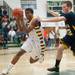 Ypsilanti's Justin Bernard  drives the ball to the basket during the third quarter of the Class A regional finales at Huron High School Wednesday, Mar.13th.Courtney Sacco I AnnArbor.com 