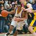 Ypsilanti's Jalen Harmon drives the ball across the court against South Lyon during the third quarter of the Class A regional finales at Huron High School Wednesday, Mar.13th.Courtney Sacco I AnnArbor.com 