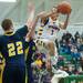 Ypsilanti's Justin Bernard jumps to make a basket against the South Lyon's during the second half of the Class A regional finales at Huron High School Wednesday, Mar.13th.Courtney Sacco I AnnArbor.com 