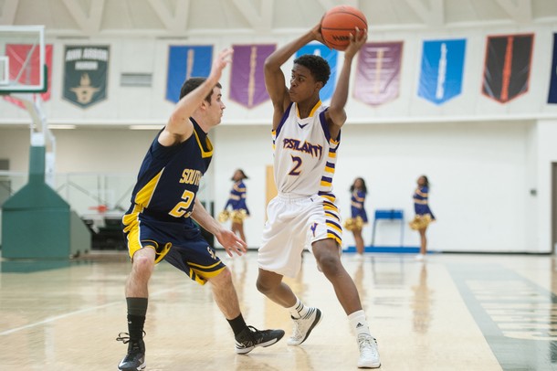 Ypsilanti's Justin Bernard drives the ball up court as he is guarded by South Lyon's Bill Harrison during the first half of the Class A regional finales at Huron High School Wednesday, Mar.13th.Courtney Sacco I AnnArbor.com 