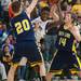 Ypsilanti's Jaylen Johnson struggles to keep control of the ball as South Lyon's Tommy Averill and conner Weidman guard him during the fourth quarter of the Class A regional finales at Huron High School Wednesday, Mar.13th.Courtney Sacco I AnnArbor.com 