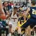 Ypsilanti's Justin Bernard drives the ball up court during the first half of the Class A regional finales at Huron High School Wednesday, Mar.13th.Courtney Sacco I AnnArbor.com 