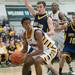 Ypsilanti's Justin Bernard looks for an open teammate after make a rebound during the first half of the Class A regional finales at Huron High School Wednesday, Mar.13th.Courtney Sacco I AnnArbor.com 