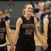 Dexter's Crystal Kedroske smiles as she looks up at the american flag hanging in the Breslin Center in East east Lansing before the start of the Class A girls state semi-finals.
Courtney Sacco I AnnArbor.com 