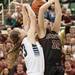Grosse Pointe South's Claire DeBoer nocks the ball out of Dexter's Crystal Kedroske hands as she tires to make a layup during the fourth quarter of Class A girls state semi-finals healed at the Breslin Center in East Lansing Friday Mar. 15th.
Courtney Sacco I AnnArbor.com  