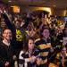 Wolverines fans cheer at Good Time Charley's on South University Avenue on Saturday night as their team defeats Syracuse in the Final Four, taking them to the NCAA National Championship. Courtney Sacco I AnnAror.com 