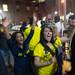 Fans spill into the streets in the immediate aftermath of the Michigan basketball team's win in the Final Four over Syracuse to advance to Monday's national championship game. Courtney Sacco I AnnArbor.com