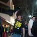 Fans spill into the streets in the immediate aftermath of the Michigan basketball team's win in the Final Four over Syracuse to advance to Monday's national championship game. Courtney Sacco I AnnArbor.com