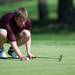 Dexter's Drew Richardson reads the green on the 10th hole during the golf match at the University of Michigan golf course Wednesday May, 1.
Courtney Sacco I AnnArbor.com   