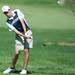 Slaine's Alex Derksen makes a chip shot on the 10th hole during the golf match at the University of Michigan golf course Wednesday May, 1.
Courtney Sacco I AnnArbor.com   