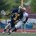 Saline's Aaron Drenski runs the ball up the field during their game against Huron, Wednesday, May 8.
Courtney Sacco I AnnArbor.com  