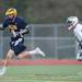 Saline's Nicholas Karapas runs the ball up the field with  Huron's Sam Richardson right behind him Wednesday, May 8.
Courtney Sacco I AnnArbor.com  