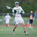 Huron's Nils Urbaniak runs the ball up the field during their game against Saline Wednesday, May 8.
Courtney Sacco I AnnArbor.com  