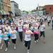 The first wave of runners take off form the starting point on Cross Street during The Color Run in Ypsilanti, Saturday May 11.
Courtney Sacco I AnnArbor.com 