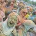 Runners covered in colored power celebrate, with music, dancing and trowing colored powder in Riverside Park after completing The Color Run in Ypsilanti, Saturday May 11.
Courtney Sacco I AnnArbor.com 