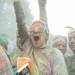 Runners throw colored powder up in the air as they celebrate in Riverside Park after completing The Color Run in Ypsilanti, Saturday May 11.
Courtney Sacco I AnnArbor.com 