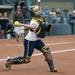 Wolverines sophomore Lauren Sweet throws the ball to first for an out during the sixth inning of their game against Valparaiso Friday May 17.
Courtney Sacco I AnnArbor.com    