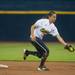 Wolverines freshmen Sierra Romero catches the ball and  throws it to first base for the finale out of their game against Valparaiso Friday May 17.
Courtney Sacco I AnnArbor.com    