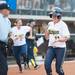 Wolverines junior Lyndsay Doyle celebrities as she crosses home plate scoring the first run for the Wolverines, Ashley Lane hits a three run home run in the first. 
Courtney Sacco I AnnArbor.com   