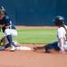 The Wolverines junior Lyndsay Doyle slides in to second base but California's Victoria Jones makes the out during the first inning of their game, Saturday May 18.
Courtney Sacco I AnnArbor.com     
