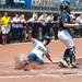 Wolverines senior Ashley Lane slides in to home base scoring the Wolverines fist run of their game against California, Saturday May 18.
Courtney Sacco I AnnArbor.com     