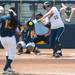 Wolverines Sara Driesenga swings at a pitch during the forth inning of their game against California, Saturday May 18.
Courtney Sacco I AnnArbor.com     