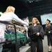 A graduate is given flowers by an audience member haver having received her degree during WCC's commencement ceremony for the class of 2013 held at the Convocation Center Saturday, May 18.
Courtney Sacco I AnnArbor.com  