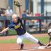 Wolverines third basemen senior Amy Knapp catches the ball for an out as California's Danielle Henderson slides in to third base during the second inning of the NCAA regional title game, Sunday May 19.
Courtney Sacco I AnnArbor.com 