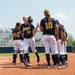 Wolverines junior Nicole Sappingfield take the field as the lineup is introduced at the start of the NCAA regional title game against California, Sunday May 19.
Courtney Sacco I AnnArbor.com 