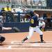 Wolverines freshmen Sierra Romero looks up after hitting a flow ball during the first inning of the NCAA regional title game against California, Sunday May 19.
Courtney Sacco I AnnArbor.com 